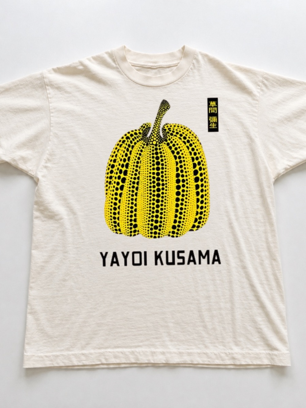 Off White Short Sleeve Tee with Yellow & Black Pumpkin Graphic
